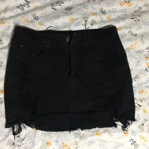 Black distressed denim skirt